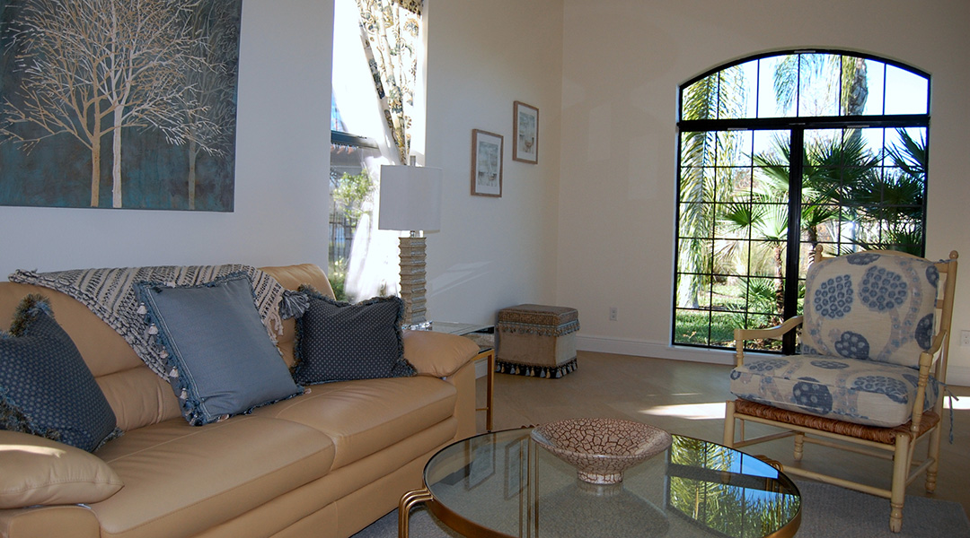 living room with tree painting